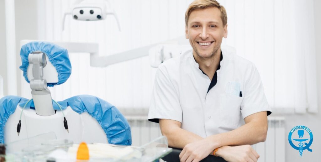 The painting shows a smiling man in a white dental apron sitting next to a modern dental chair equipped with dental instruments. The man has light-coloured hair and looks happy. The logo of the dental clinic is visible in the background.