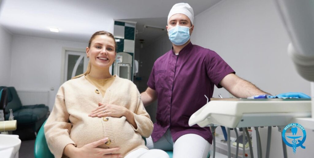 The painting depicts a smiling patient sitting in a dental chair and a dentist in a protective apron and mask standing by her. By the chair are professional dental instruments. The scenery is indicative of a dental practice in the UK.